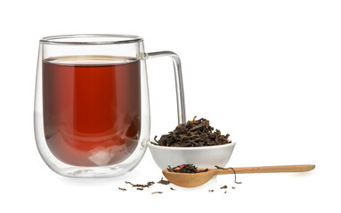 Cup of black tea and bowl with dry leaves on white background