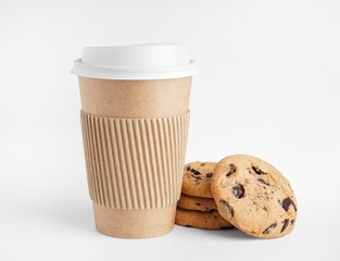 Paper cup and tasty cookies on white background