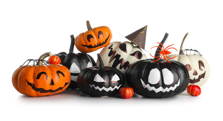 Halloween pumpkins with drawn faces and spiders on white background