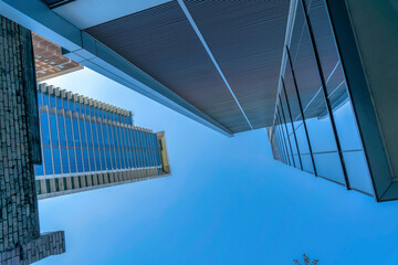 Fototapeta premium Bottom view of modern skyscrapers in business district of downtown Austin Texas