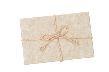 Brown paper giftbox with rope bow isolated