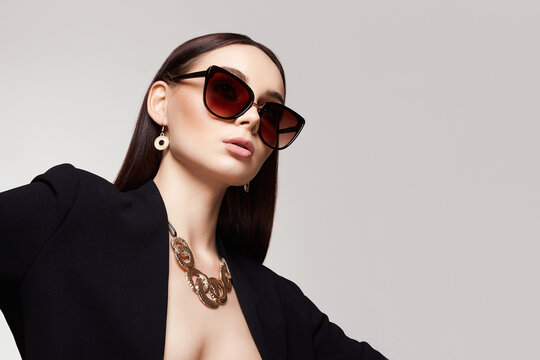 Beautiful Sexy Woman In Sunglasses And Jewelry