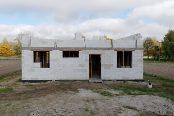 Construction residential new house in progress. Real estate under construction  