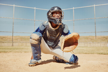 Baseball, sports and man waiting on a field during a game, competition or training. Athlete catcher...
