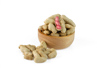 Raw Peanuts in wooden bowl isolated on white background.