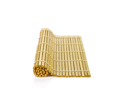 bamboo mat for making japanese sushi isolated on white background
