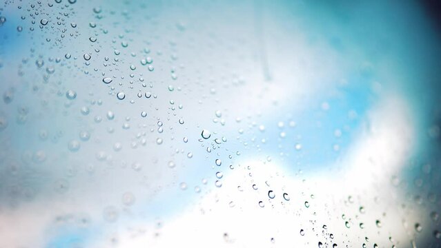 raindrops on the window glass. wet condensation on the window glass autumn rainy weather. foggy steam on lifestyle the window of the house