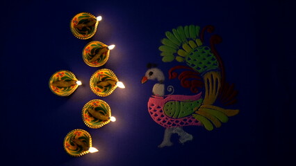 Colorful diya lamps lit during diwali celebration. Indian festival Happy Diwali, Holiday...
