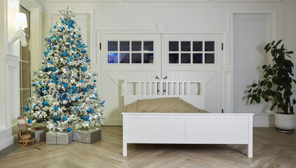 Room decorated for Christmas or new year. The interior of the room with a Christmas tree and decorations