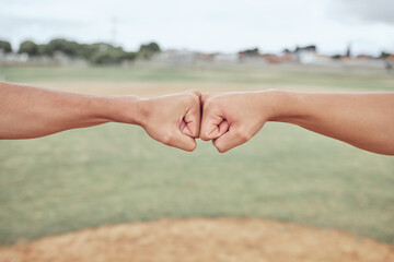 Hands, fist bump and friends outdoor in nature for partnership, friendship and support on a field. Baseball or softball pitch, team building and men athletes doing a solidarity gesture together. - Powered by Adobe
