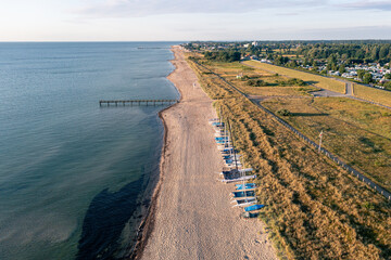 Obraz premium Dahme, Germany - July 31, 2021: Aerial drone view of Dahme Beach in Schleswig-Holstein.