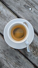 cup of coffee on wooden table