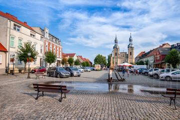 Market square and Church of the Blessed Virgin Mary of the Assumption in Zbaszyn, Greater Poland Voivodeship, Poland	
