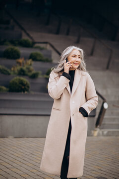 Elderly Business Woman Talking On The Phone