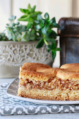 Traditional apple pie on the table.