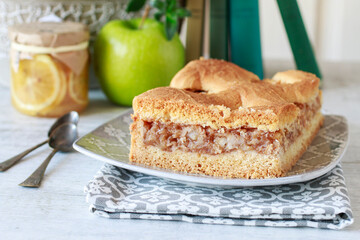 Traditional apple pie on the table.