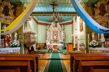 Fototapeta na wymiar Church of All Saints in Rychnow, Greater Poland Voivodeship, Poland 