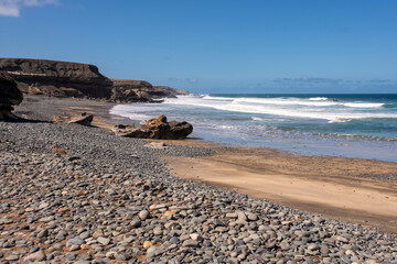 Scenic View of Beach and cliffs on Summer Time, Playa de Garcey, Fuerteventura, Canary islands, Spain