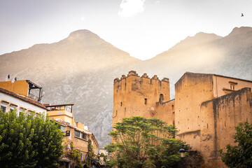 kasbah in chefchaouen, morocco, warm evening light, north africa