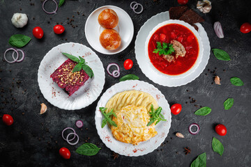 Traditional National Kazakh dishes Kazakh borscht, beet salad with walnuts. .Cooked from beef or lamb