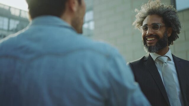 Cinematic and storytelling footage of a young entrepreneur going to work in his successful start up business about technology and green energy. Corporate and lifestyle concepts