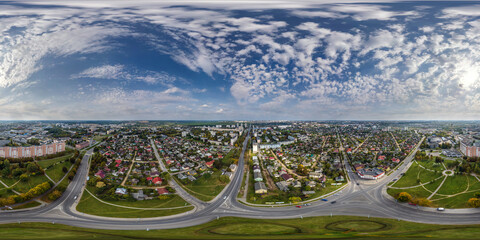 aerial full seamless spherical hdri 360 panorama view above road junction with traffic in small...