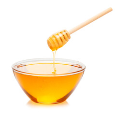 fresh natural honey in transparent cup with honey dipper isolated on white.