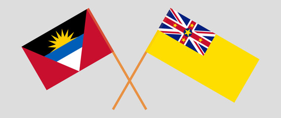 Crossed flags of Antigua and Barbuda and Niue. Official colors. Correct proportion
