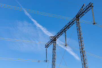 power line mast against the blue sky