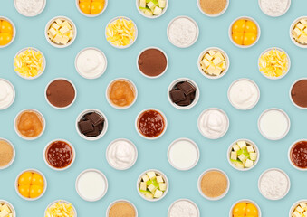 Food pattern. Cake ingredients. Dessert recipe. Flour, eggs, cream, compote, jam, almonds, milk, sugar, butter, chocolate. Soft and decorative pattern. Blue background.