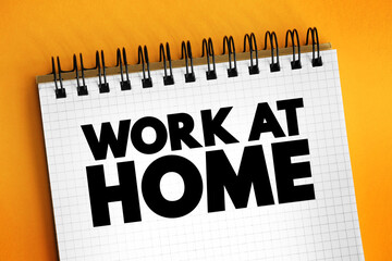 Work at home text on notepad, concept background