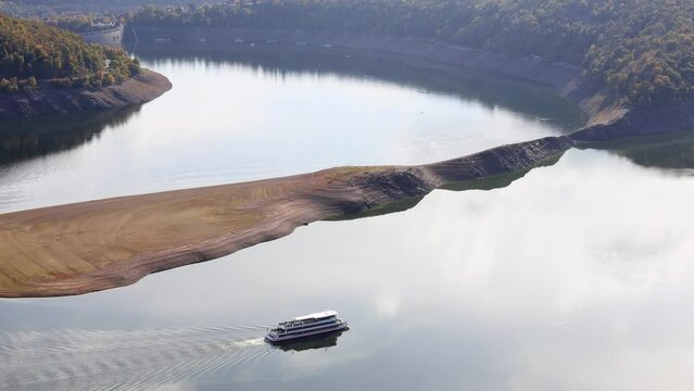the german edersee lake with a passenger ship at very low water 4k 30fps video