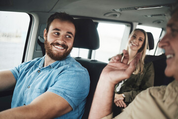 Naklejka premium Happy man driving car, travel on road trip for family vacation in Dublin and journey on countryside highway. Group transport together, friends summer adventure and vehicle driver smile at father