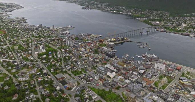 Troms&oslash; Norway Aerial v10 birds eye view panning across troms&oslash;ya island from troms&oslash;ysundet strait towards international airport capturing residential neighborhoods - Shot with Mavic 3 Cine - June 2022