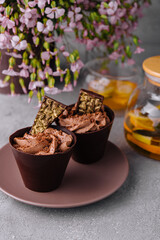 Chocolate cup cakes with tea pot
