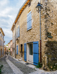 Medieval houses and cobblestone street in the village of Rochemaure, in the South of France (Ardeche)