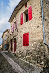 Medieval houses and cobblestone street in the village of Rochemaure, in the South of France (Ardeche)