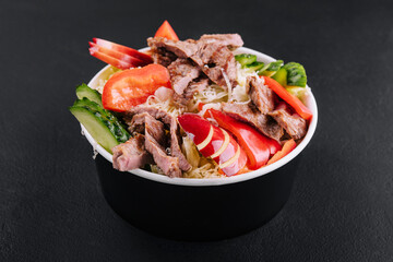 Warm salad with veal and vegetables