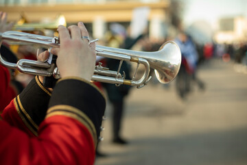 Military band in parade. Trumpeters on street. Trumpeter plays tune. Orchestra in Russia.