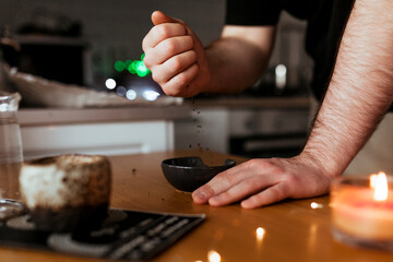 Young man prepares chinese pu-erh tea for the tea ceremony