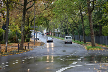 traffic on the rainy road in autumn