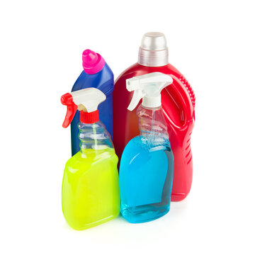 Bottles with household chemicals isolated on white.