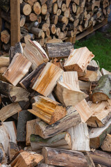 Tree trunks cut and chopped in a heap ready to be laid. Fuel.