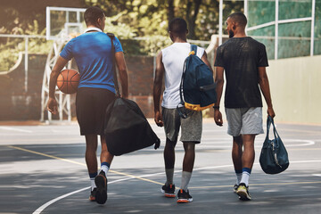 Sports, Basketball and team walking to training workout on basketball court outdoors. African athlete men talking, fitness exercise and healthy sport teamwork with ball practice for competition