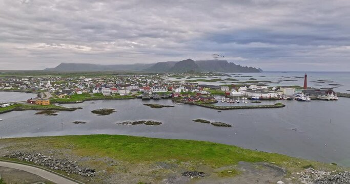 Andenes Norway v1 picture perfect landscape view drone flyover small fishing village capturing coastal town center residential neighborhood and pristine andfjorden - Shot with Mavic 3 Cine - June 2022
