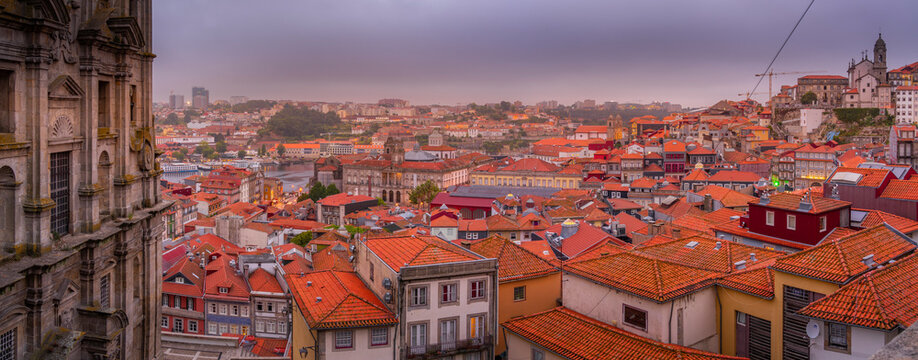 View of the Igreja dos Grilos Church and terracota rooftops of The Ribeira district at sunset, UNESCO World Heritage Site, Porto, Norte