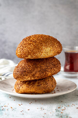 Turkish sesame and cheddar pogaca. Traditional flavors. Pogaca on gray background. close up