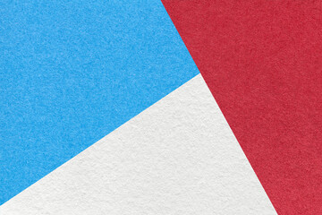 Fototapeta na wymiar Texture of craft white, red and blue color paper background, macro. Vintage wine abstract cardboard with gradient.