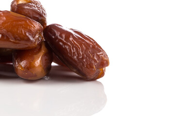 Date fruit close up isolated on white background