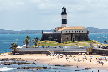 Farol da Barra Lighthouse at Salvador on a sunny summer day. Historic architecture of Salvador, Brazil